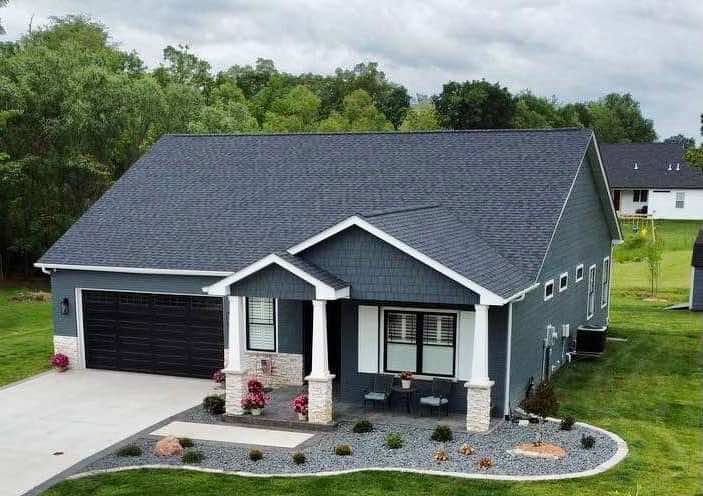 Completed custom-home exterior by Timberline Design + Build