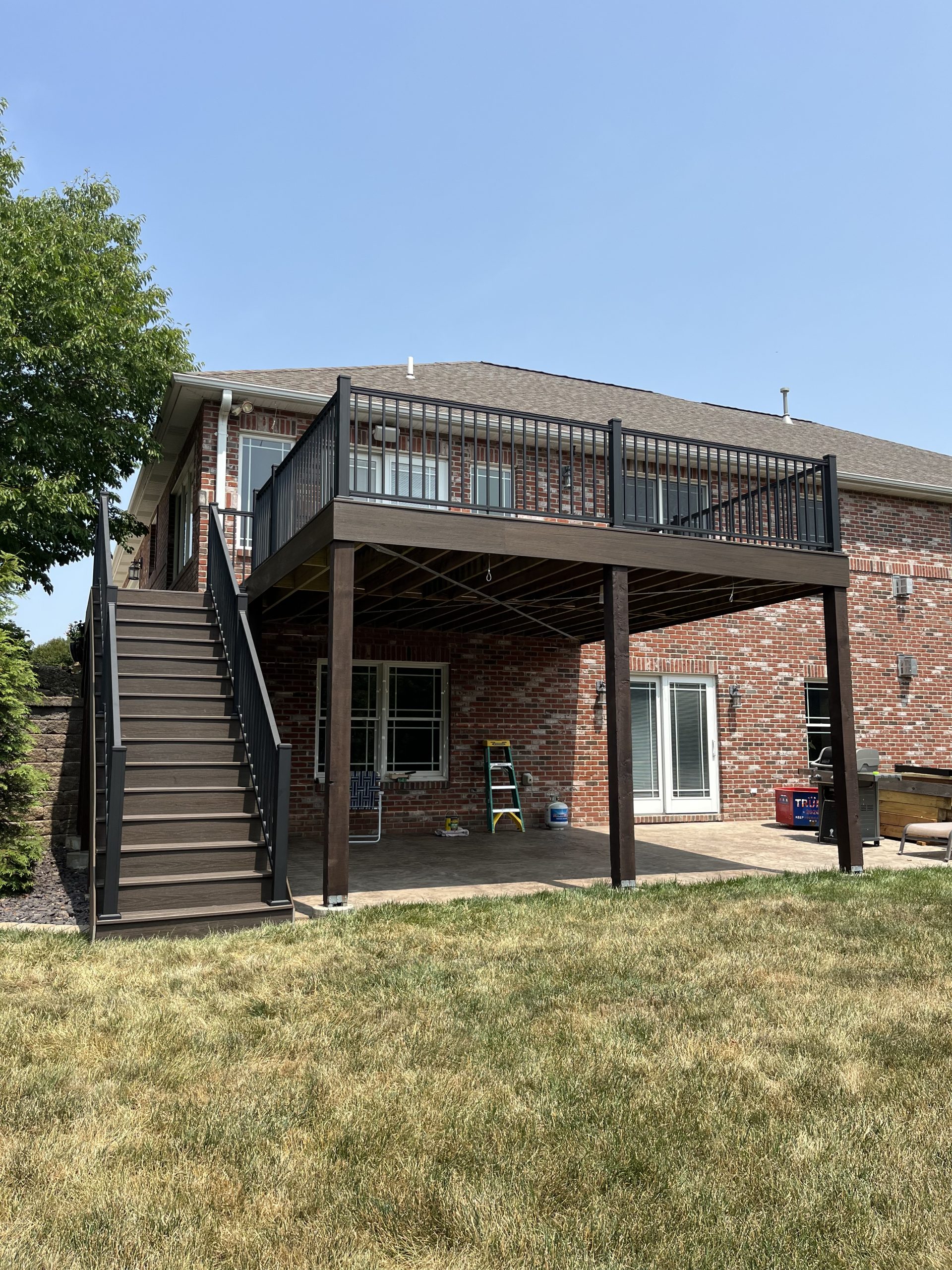Completed raised deck and covered patio addition